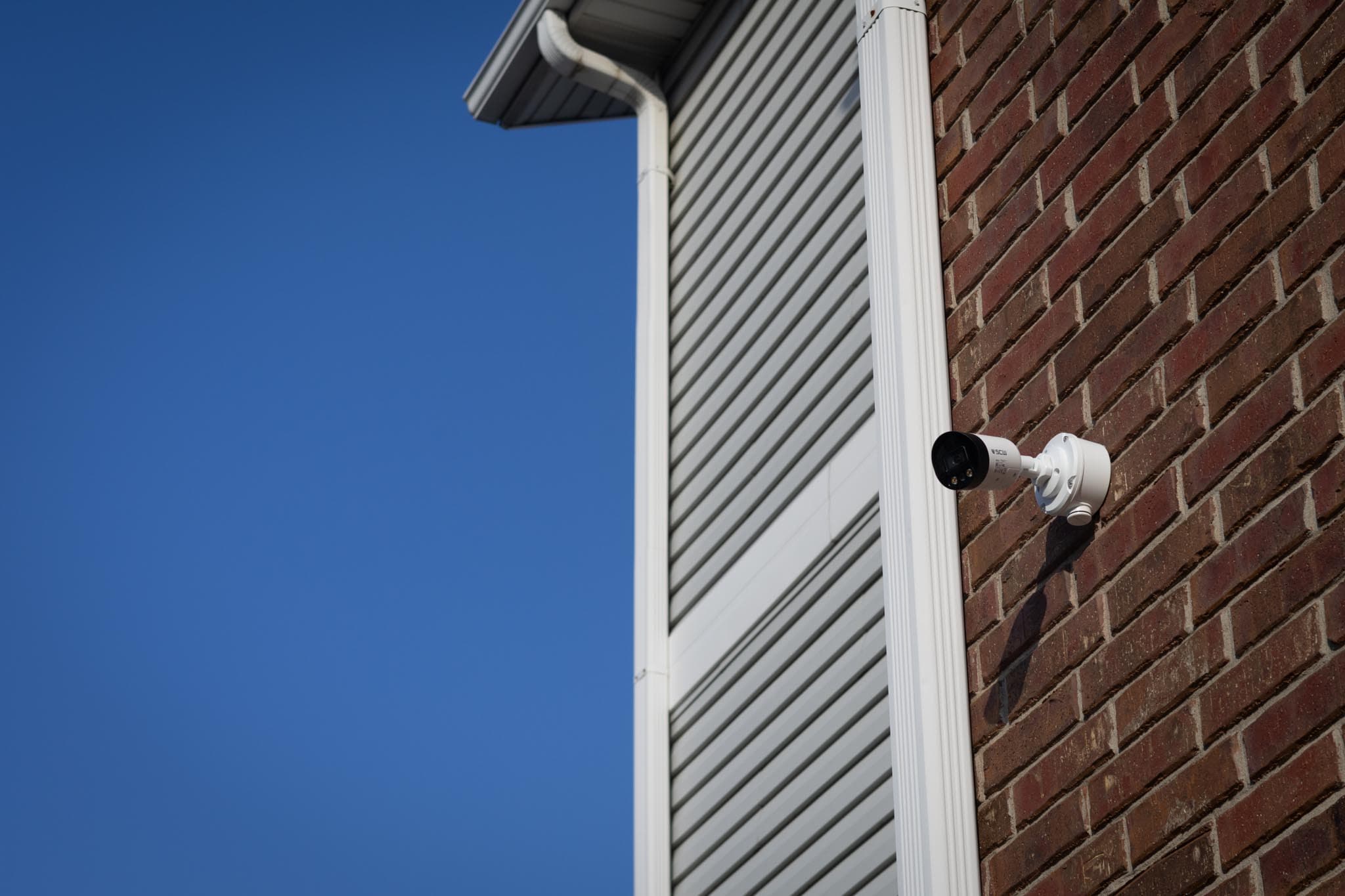 A security camera on a building